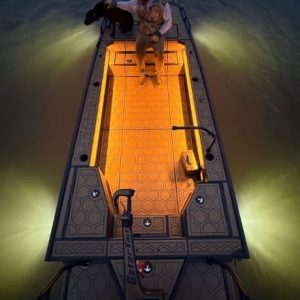 night time view of custom lighting on mud boat