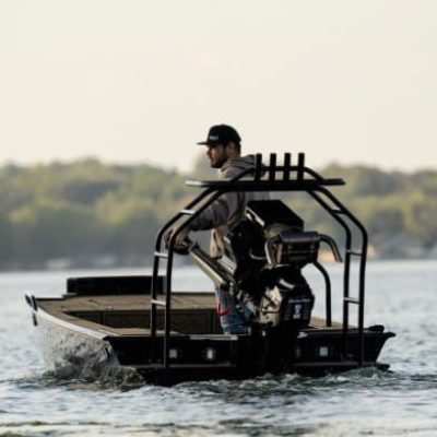 mud motor on custom boat build being driven on a lake