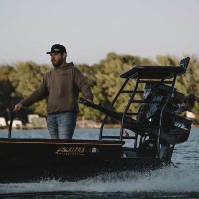 Owner of Alpha Customs driving a custom boat build