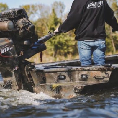 hunting boat driving on a lake in Minnesota